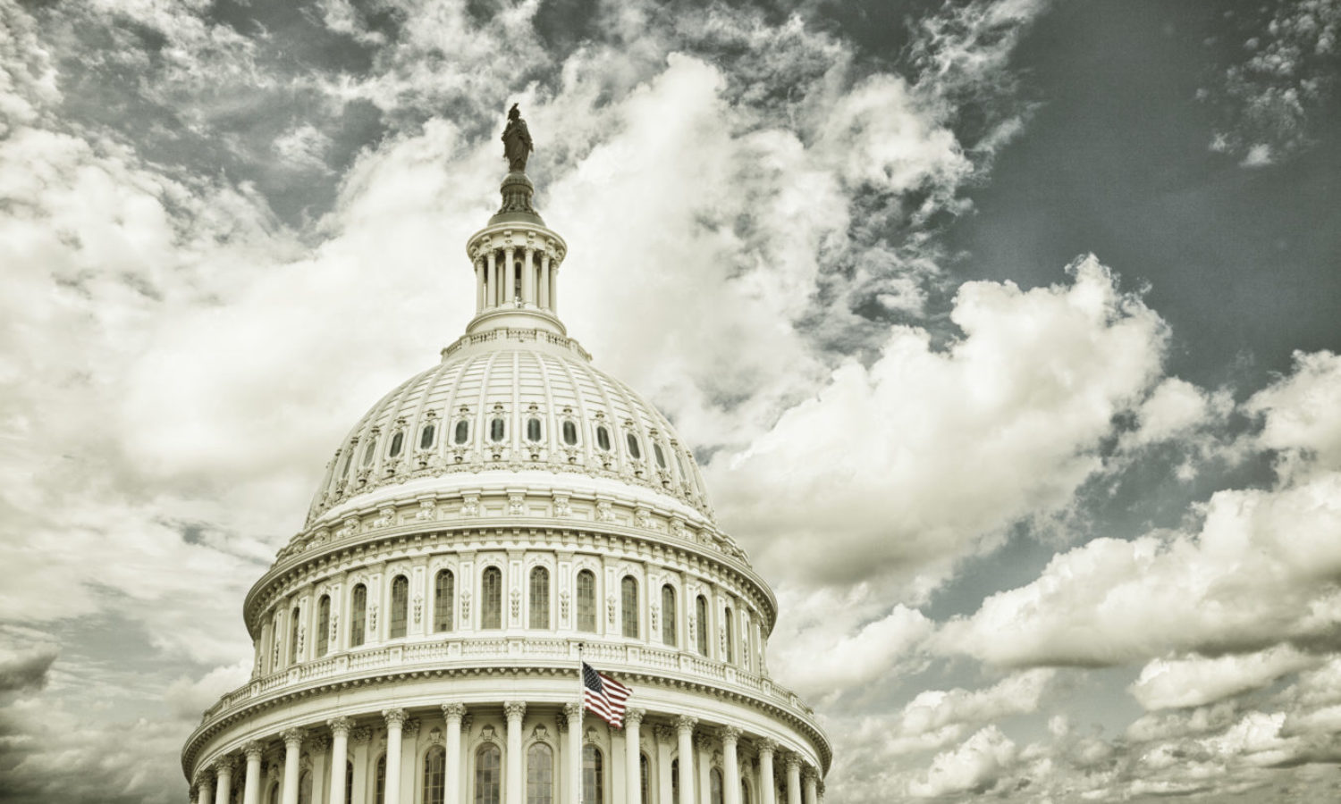 US Capitol dome with clouds